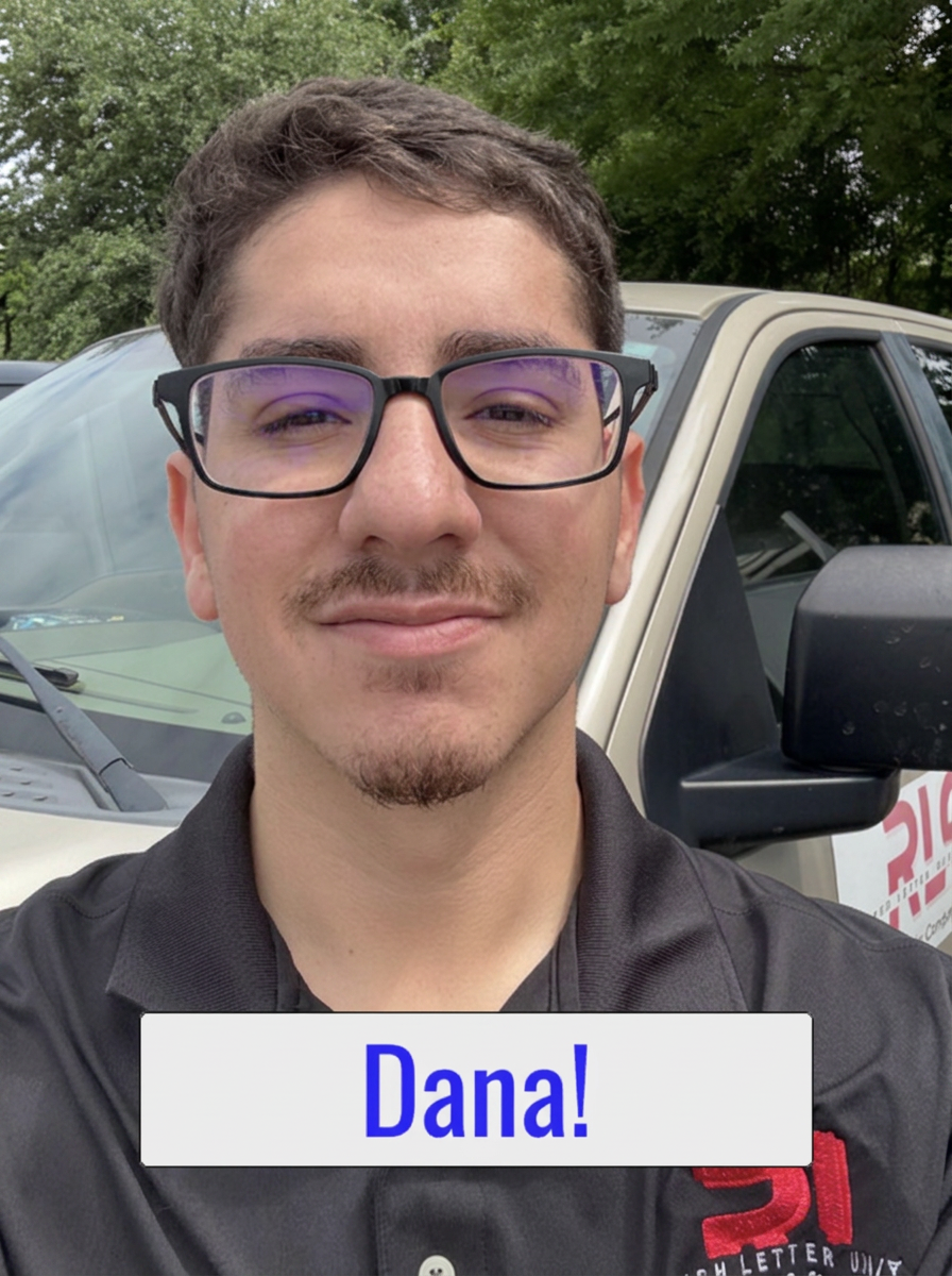 Technician from ABC Plumbing smiling in front of a work truck with a caption reading Dana!